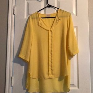 Bright yellow 3/4 length shirt